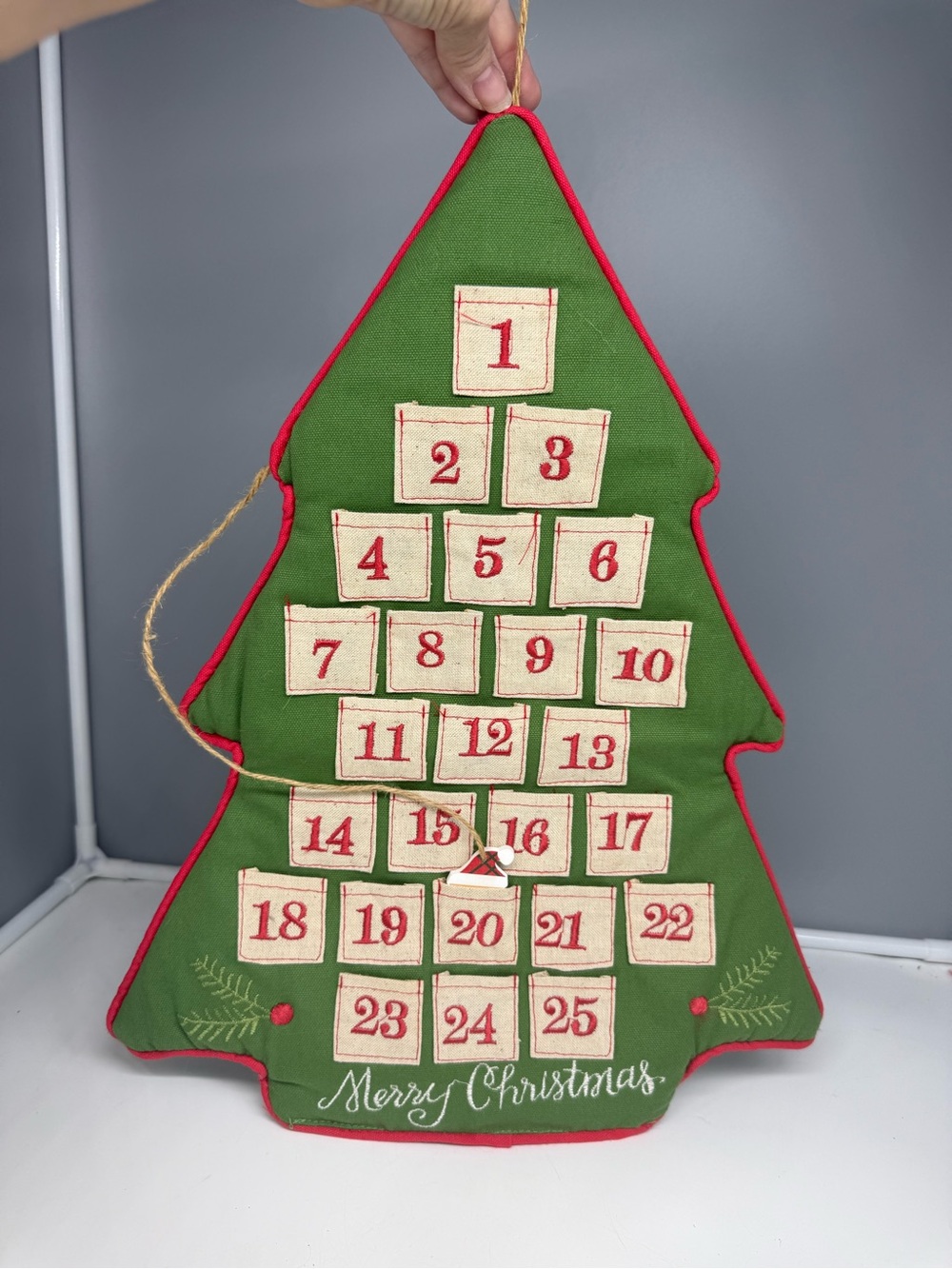 Christmas tree-shaped advent calendar numbered pockets holiday count down